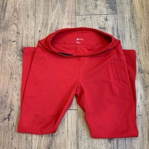 Zella Red Medium leggings with pocket detail - new without tags. Never worn.
